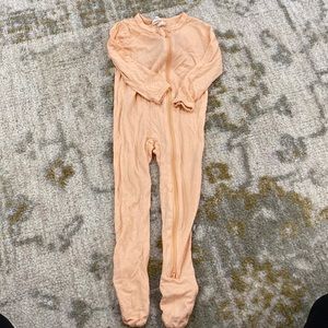 Kyte 12-18 months light orange zipped footed pajamas great used condition.